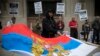 FILE - A protester waves Russia's presidential flag during a demonstration outside Ukraine's consulate in New York May 8, 2014.