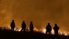 Thousands Flee 2 Fast-Moving California Wildfires