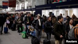 People line up for security ahead of the holidays at LaGuardia Airport in Queens, New York City, U.S.