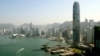 资料照片: 2003年11月3日香港竣工的88层国际金融中心(右)
