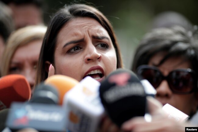 Soley Zambrano, daughter of Edgar Zambrano, National Assembly vice president, speaks during a news conference outside the 'El Helicoide', a detention center of the Bolivarian National Intelligence Service, where her father is under arrest in Caracas, May 9, 2019.