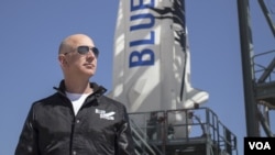 Jeff Bezos, founder of Blue Origin, inspects New Shepard’s West Texas launch facility before the rocket’s maiden voyage. (Blue Origin)