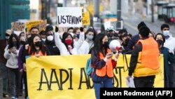 Unjuk rasa "We Are Not Silent" melawan kebencian anti-Asia sebagai tanggapan atas kejahatan anti-Asia baru-baru ini di Chinatown-Distrik Internasional Seattle, Washington pada 13 Maret 2021. (Foto: AFP/Jason Redmond)