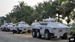 UN armored personnel carriers (APC) park near the Gulf Hotel in Abidjan, 18 Dec 2010