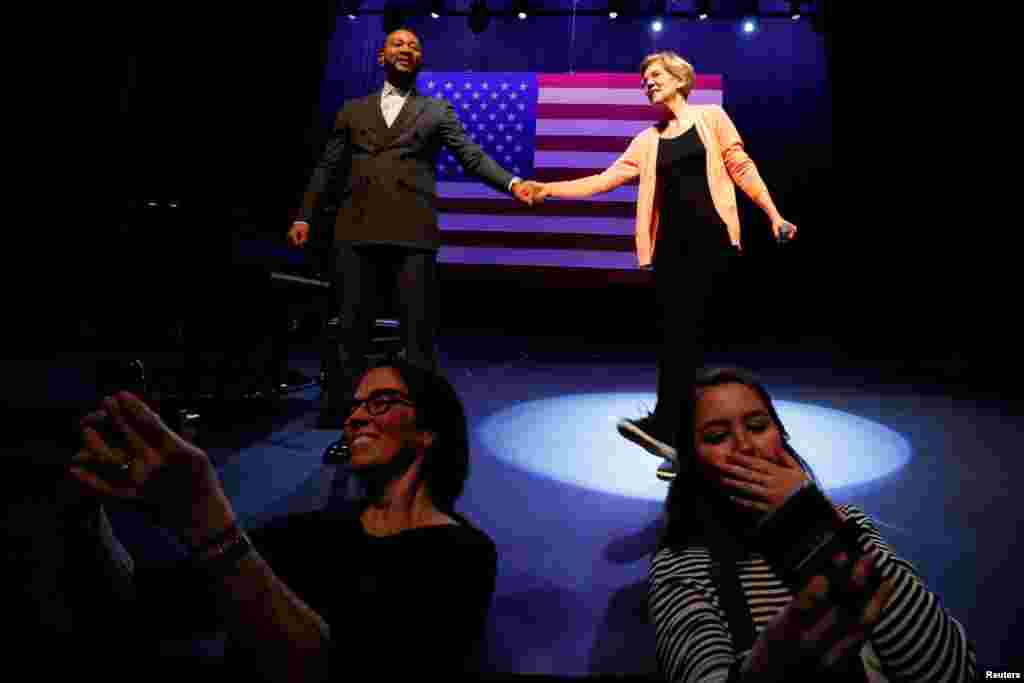 Democratic U.S. presidential candidate and Senator Elizabeth Warren (D-MA) is joined by musician John Legend at a Get Out the Vote Event in Charleston, South Carolina, Feb. 26, 2020.