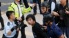 Polisi Hong Kong Bersihkan Tempat Demonstrasi