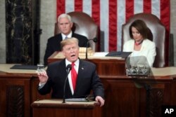 President Donald Trump delivers his State of the Union address to a joint session of Congress on Capitol Hill in Washington, as Vice President Mike Pence and Speaker of the House Nancy Pelosi, D-Calif., watch, Feb. 5, 2019.