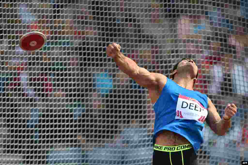 India&#39;s Jai Deep competes in the final of the men&#39;s discus throw F42/44 athletics event at Hampden Park during the 2014 Commonwealth Games in Glasgow, Scotland.