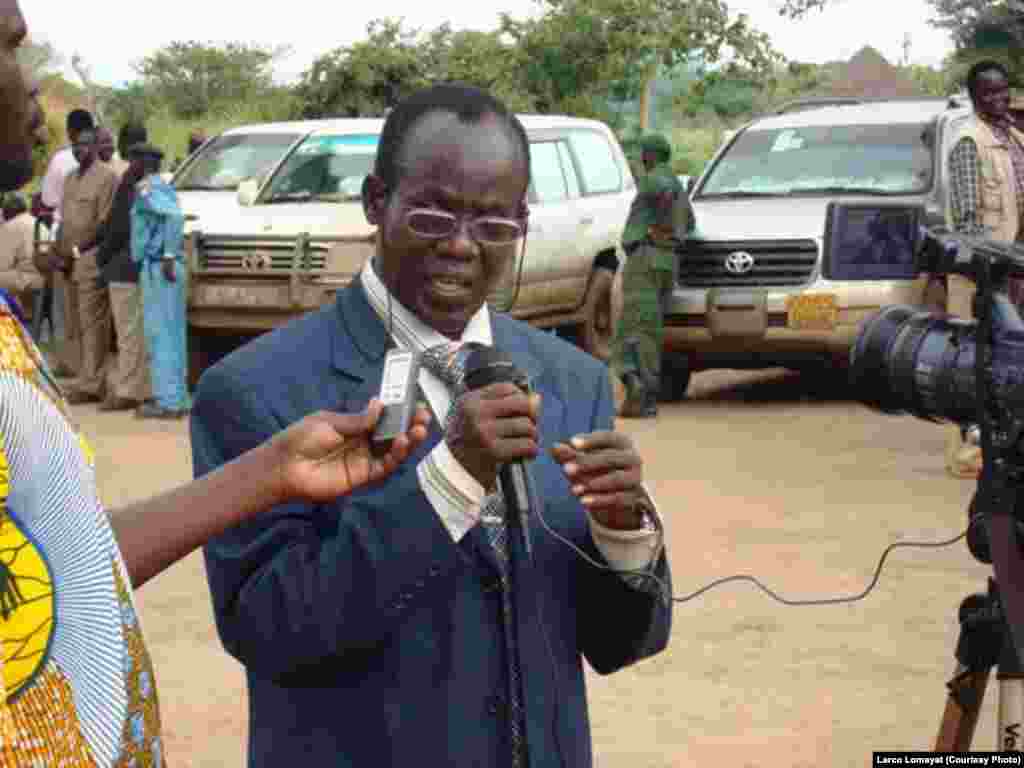 Newly approved South Sudanese Vice President James Wani Igga speaks to reporters.
