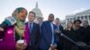 FILE - Rep. Ilhan Omar, D-Minn., left, Rep. Mike Levin, D-Calif., Rep. Christopher Pappas, D-N.H., Rep. Joe Neguse, D-Colo., and other freshmen member of the House of Representatives speak on Capitol Hill.