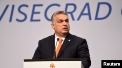 រូបឯកសារ​៖​ នាយករដ្ឋមន្រ្តី​ហុងគ្រី លោក Viktor Orban ថ្លែងនៅ​ក្នុង​សន្និសីទសារព័ត៌មាន​មួយ​ក្នុង​ក្រុង​ប៊ុយដាប៉េស ប្រទេស​ហុងគ្រី កាល​ពី​ថ្ងៃទី២១ ខែមិថុនា ឆ្នាំ​២០១៨។