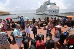 Thousands of people evacuating Puerto Rico line up to get on a cruise ship in the aftermath of Hurricane Maria in San Juan, Puerto Rico, Sept. 28, 2017.