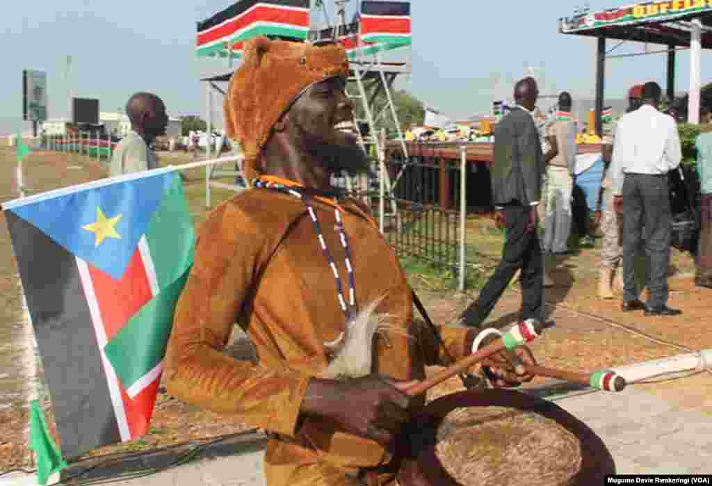 A drummer performs at an event in Juba to celebrate South Sudan's fourth anniversary of independence on Thursday, July 9, 2015. 