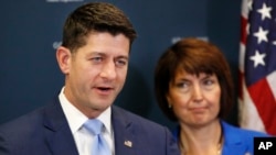 House Speaker Paul Ryan of Wis., (L) speaks next to Rep. Cathy McMorris Rodgers, R-Wash., during a news conference following a GOP caucus meeting, July 24, 2018, on Capitol Hill in Washington. 