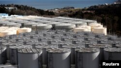 Storage tanks for radioactive water are seen at Tokyo Electric Power Co's (TEPCO) tsunami-crippled Fukushima Daiichi nuclear power plant in Okuma town, Fukushima prefecture, Japan, Feb. 18, 2019.