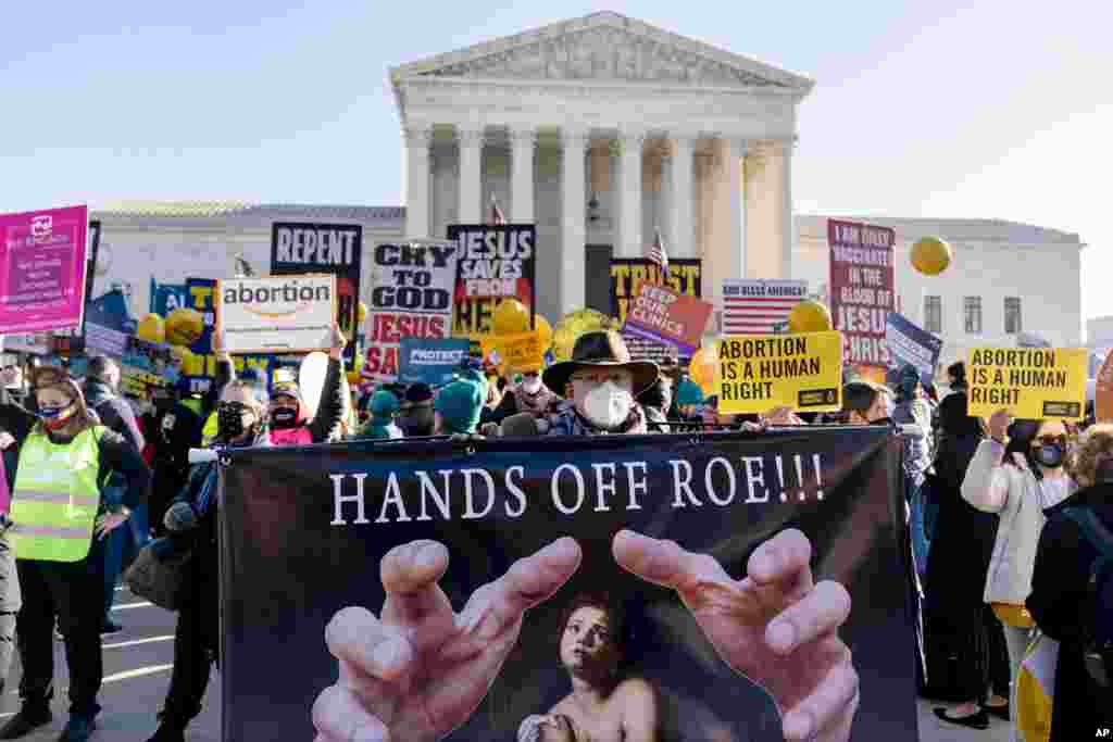 Abortion rights advocates and anti-abortion protesters demonstrate in front of the U.S. Supreme Court in Washington, as the court hears arguments in a case from Mississippi, where a 2018 law would ban abortions after 15 weeks of pregnancy, well before viability.&nbsp;
