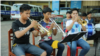 Uth Vicheka, center, practices with other trumpet players at Kolab Primary School on October 7, 2018. (Rithy Odom/VOA Khmer)