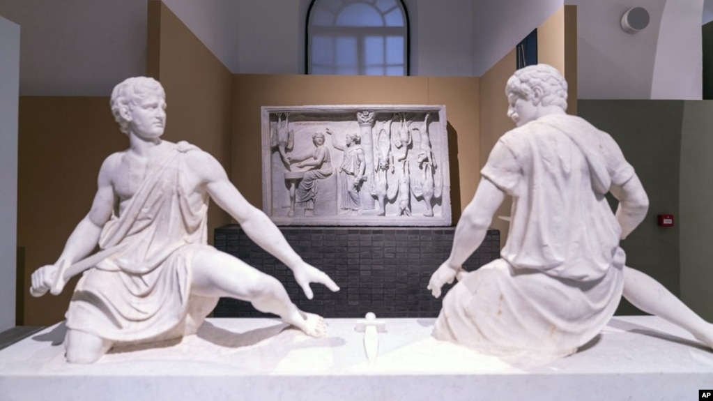 In this undated photo made available Monday, Oct. 12, 2020, ancient Greek and Roman marble statues are seen prior to going on display in the newly refurbished Villa Caffarelli. (Fondazione Torlonia via AP)