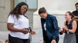 Rep. Cori Bush, D-Mo., and Rep. Alexandria Ocasio-Cortez, D-N.Y., have an impromptu dance party to 