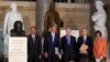 From left, House Speaker John Boehner, Secretary of State John Kerry, Senate Majority Leader Harry Reid, Senate Minority Leader Mitch McConnell and House Minority Leader Nancy Pelosi arrive in Statuary Hall on Capitol Hill for a ceremony to dedicate a bust of Winston Churchill, Oct. 30, 2013. 