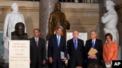 From left, House Speaker John Boehner, Secretary of State John Kerry, Senate Majority Leader Harry Reid, Senate Minority Leader Mitch McConnell and House Minority Leader Nancy Pelosi arrive in Statuary Hall on Capitol Hill for a ceremony to dedicate a bust of Winston Churchill, Oct. 30, 2013. 