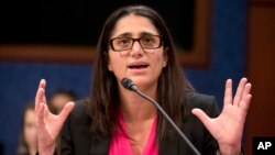 FILE - Hurley Medical Center Pediatric Residency Program Director Dr. Mona Hanna-Attisha speaks during a House Democratic Steering and Policy Committee hearing on the Flint water crisis on Capitol Hill in Washington, Feb. 10, 2016.