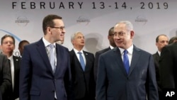 Польський прем’єр-міністр Матеуш Моравецкі та ізраїльський прем’єр-міністр Беньямін Нетаньягу на саміті у Варшаві 14 лютого 2019 року