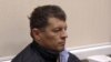 Российское обвинение запросило 14 лет лишения свободы для украинского журналиста Романа Сущенко 