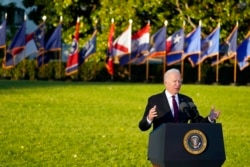 President Joe Biden speaks before signing the "Infrastructure Investment and Jobs Act" during an event on the South Lawn of the White House, Nov. 15, 2021.