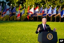 President Joe Biden speaks before signing the "Infrastructure Investment and Jobs Act" during an event on the South Lawn of the White House, Nov. 15, 2021.