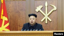 FILE - North Korean leader Kim Jong Un delivers a New Year's address.