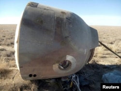 A view shows the Soyuz capsule that carried U.S. astronaut Nick Hague and Russian cosmonaut Alexei Ovchinin, after it made an emergency landing, near the city of Zhezkazgan in central Kazakhstan, Oct. 11, 2018.