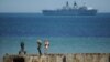 Britain Calls on NATO Help in Submarine Hunt