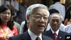 FILE - Vietnam's Communist Party General Secretary Nguyen Phu Trong. When the plants were approved in 2009, the government had projected power demand growth of 17-20 percent per year, but new projections are lower.