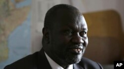 FILE - South Sudan rebel leader Riek Machar speaks in an interview with The Associated Press in Johannesburg, South Africa, Oct. 20, 2016.