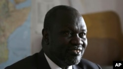 FILE - South Sudan rebel leader Riek Machar speaks in an interview with The Associated Press in Johannesburg, South Africa, Oct. 20, 2016.