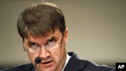 FILE - Veterans Affairs Secretary nominee Robert Wilkie testifies during a Senate Veterans Affairs Committee nominations hearing on Capitol Hill in Washington, June 27, 2018.