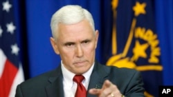 FILE - Indiana Gov. Mike Pence takes a question during a news conference in Indianapolis, March 31, 2015.
