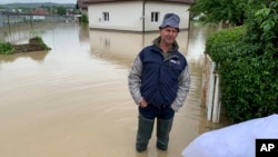 Poplave u Doboju, 14. maj 2019. (AP Photo/Eldar Emric)