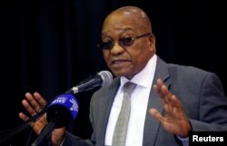 FILE - South Africa's President Jacob Zuma addresses an anti-crime meeting in Elsie's River, Cape Town, South Africa, May 30, 2017.