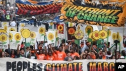 La marche populaire contre le réchauffement climatique à New York dimanche 21 septembre 2014 (AP)