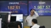 World Markets Mixed on Steadied US Rates