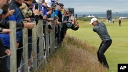 United States’ Jordan Spieth plays from the rough on hole 16 during a practice round at the British Open Golf Championship at the Old Course, St. Andrews, Scotland, July 15, 2015.