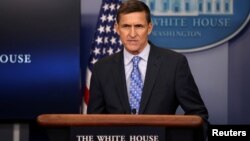 FILE - National security adviser General Michael Flynn delivers a statement during a briefing at the White House in Washington, Feb. 1, 2017.