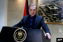 Nabil Abu Rudeinah, spokesman for the Palestinian president, speaks at a press conference in Ramallah in the West Bank, Dec. 5, 2017. U.S. President Donald Trump told Palestinian President Mahmoud Abbas of "his intention to move the U.S. Embassy from Tel Aviv to Jerusalem," a statement from the Palestinian presidency said Dec. 5. It was not clear from the statement whether Trump planned to move the embassy immediately or at some point in the future.