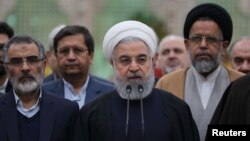 Iran's President Hassan Rouhani speaks during his visit to the shrine of the founder of the Islamic Republic, Ayatollah Ruhollah Khomeini, south of Tehran, Iran, Jan. 30, 2019. 