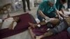 卡扎菲兒子死後中國呼籲利比亞停火