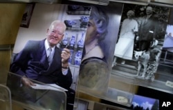 FILE - Postcards of President Herbert Hoover sit on display in the gift shop at the Herbert Hoover Presidential Library and Museum in West Branch, Iowa.