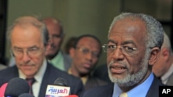 Sudan's Foreign Minister Ali Karti (R) speaks during a joint news conference with newly appointed U.S. special envoy for Sudan Princeton Lyman, in Khartoum, April 6, 2011