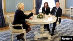 Russian President Vladimir Putin meets with Marine Le Pen, French National Front (FN) political party leader and candidate for the French 2017 presidential election, in Moscow, Russia, March 24, 2017. 